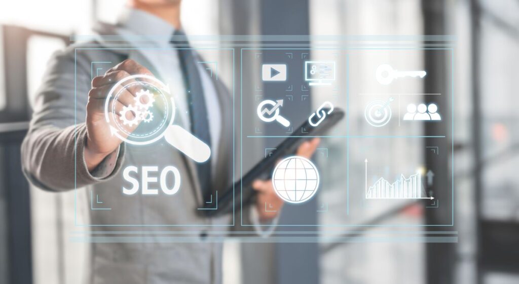 SEO Analytics showing on a screen with a man in the background.