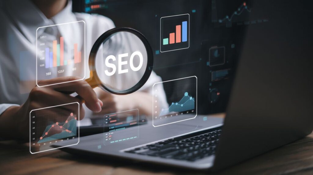 Magnifying glass over "SEO" on a laptop with charts showing semantic SEO analysis.